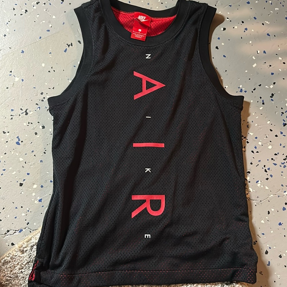 Nike youth larger jersey